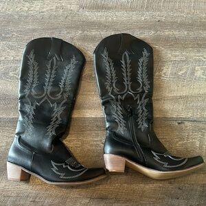 Black knee high cowboy boots